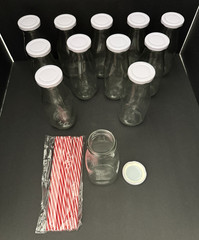 10 oz. Glass Milk Bottles with Reusable Lids and Red & White Straws Lot of 12