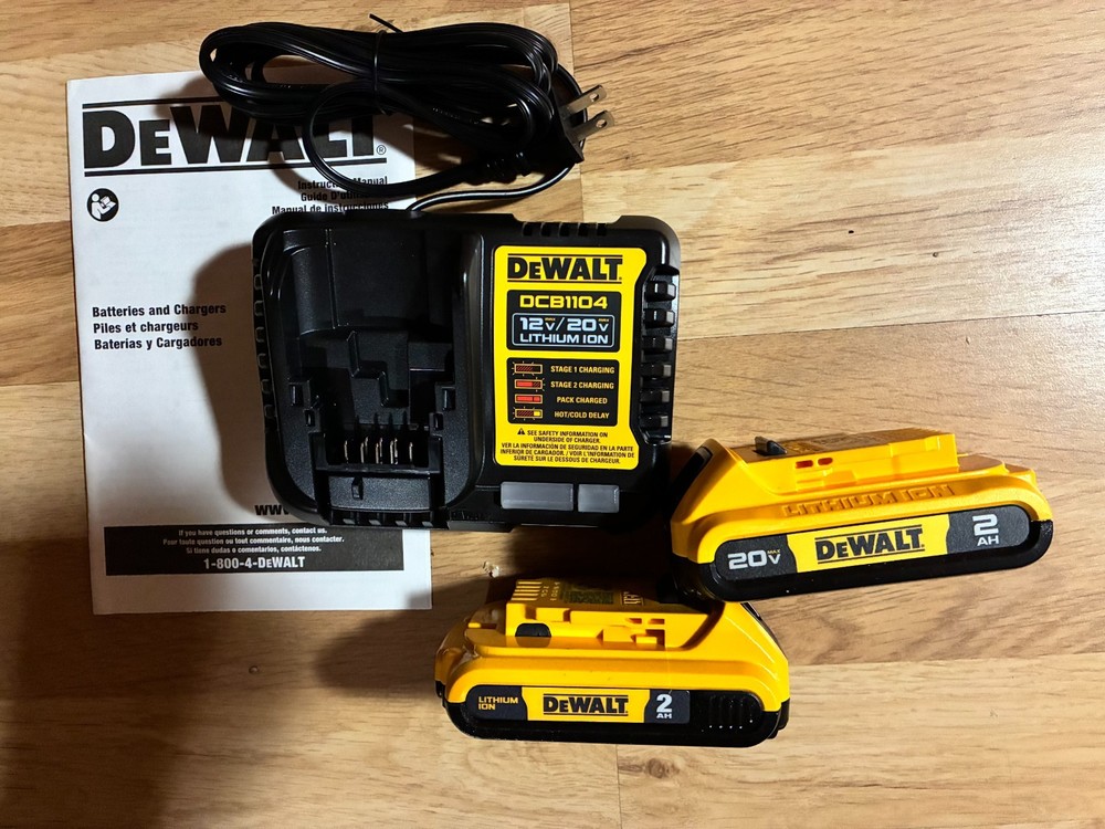 Two Dewalt DCB203 Batteries and DCB1104 charger