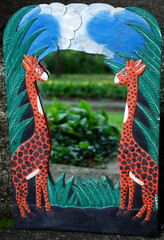 Vtg Hand Carved Painted WOOD MIRROR Jungle Giraffes 18.5″ Orange Green Blk BALI