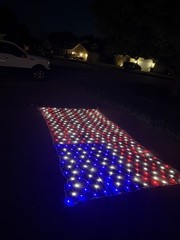 Large outdoor light up American flag net light for 4th of July. 6.5ft by 13ft.