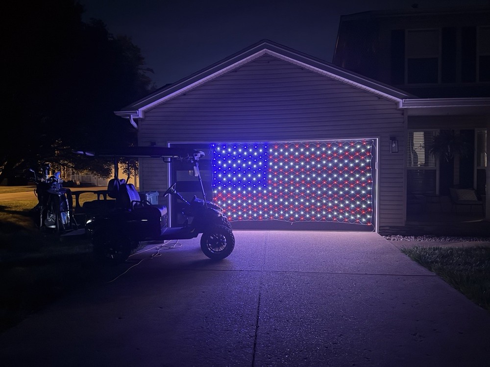 Large outdoor light up American flag net light for 4th of July. 6.5ft by 13ft.