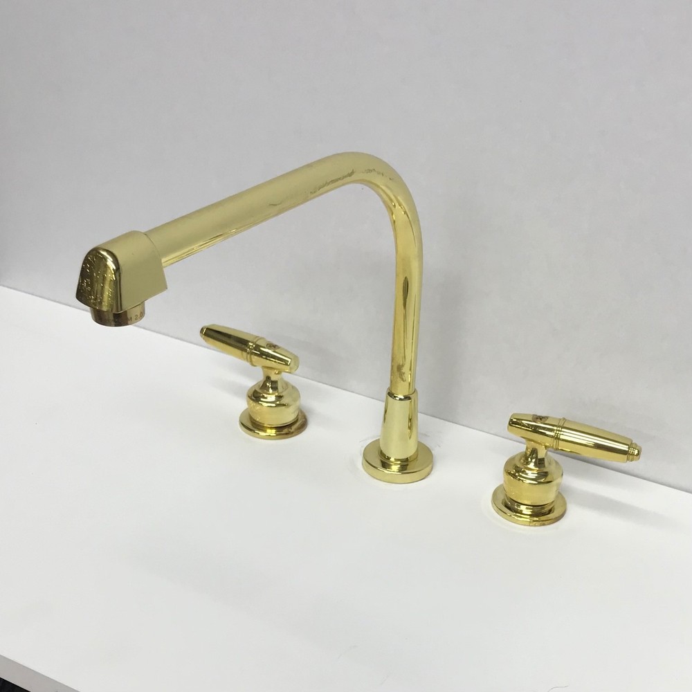 DELTA, water fall polished brass kitchen/bar faucet. wide spread. #2274 pb shp