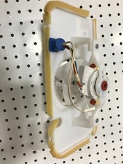 GE Refrigerator evaporator fan motor Part WR60X30370 with casing and gasket M96