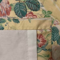 Custom-made vintage yellow-and-white floral stripe pinch-pleated curtains and va