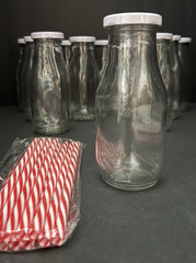 10 oz. Glass Milk Bottles with Reusable Lids and Red & White Straws Lot of 12