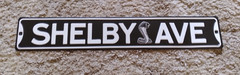 Shelby Ave Metal Sign Snake Logo Black and White Decor Wall Art 20 x 3.33in