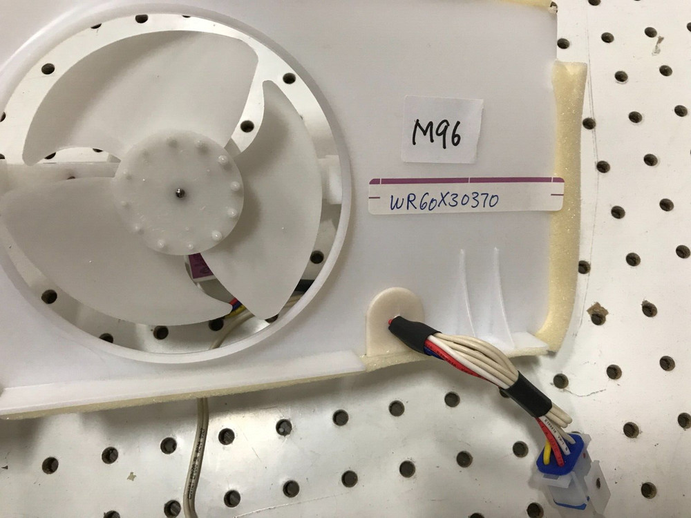 GE Refrigerator evaporator fan motor Part WR60X30370 with casing and gasket M96