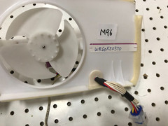 GE Refrigerator evaporator fan motor Part WR60X30370 with casing and gasket M96