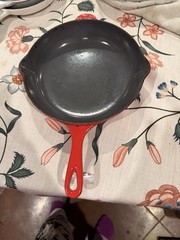 Le Creuset red Sauté Pan With Black Non Stick Coating Inside, Enamel Outside.